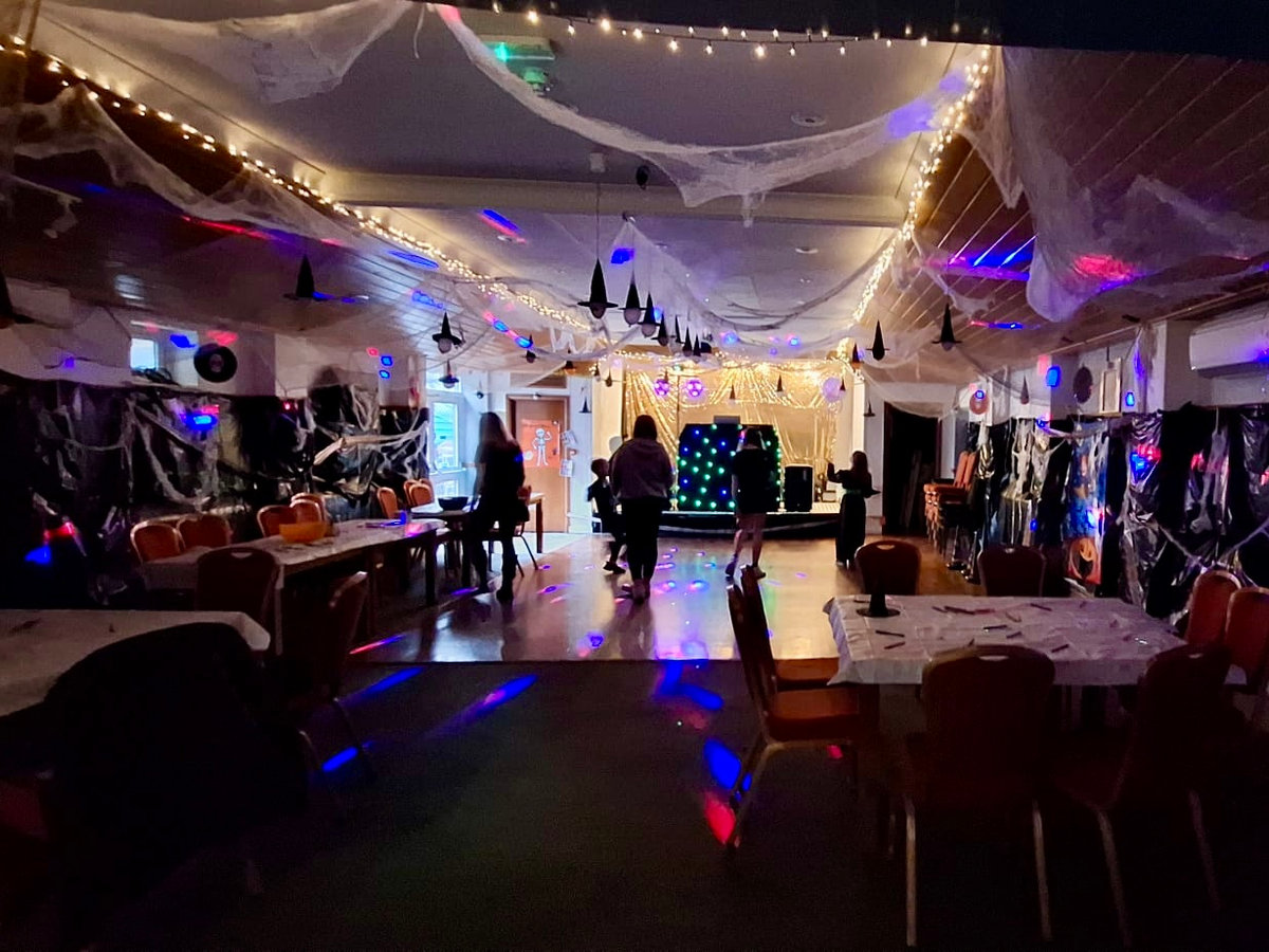 Guests on the dance floor during an evening event at the club